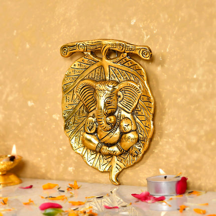 Metal Golden Lord Ganesha on Leaf Wall Hanging Sculpture Decorative Religious Showpiece for Home Wall Decor Pooja Room Temple & House Warming Gifts