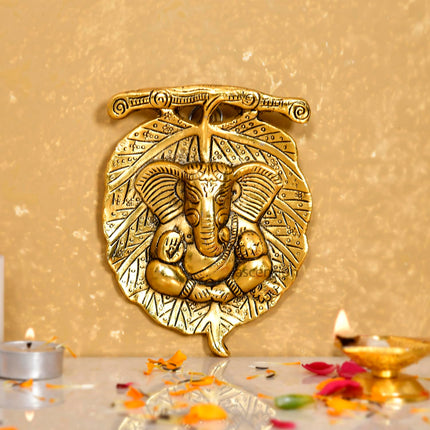 Metal Golden Lord Ganesha on Leaf Wall Hanging Sculpture Decorative Religious Showpiece for Home Wall Decor Pooja Room Temple & House Warming Gifts
