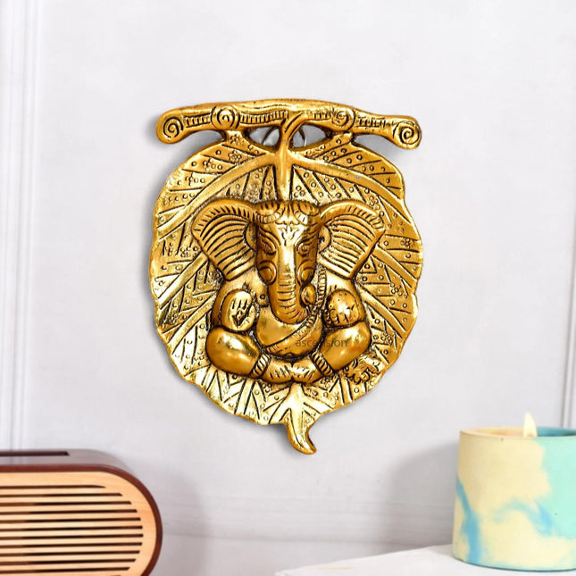 Metal Golden Lord Ganesha on Leaf Wall Hanging Sculpture Decorative Religious Showpiece for Home Wall Decor Pooja Room Temple & House Warming Gifts